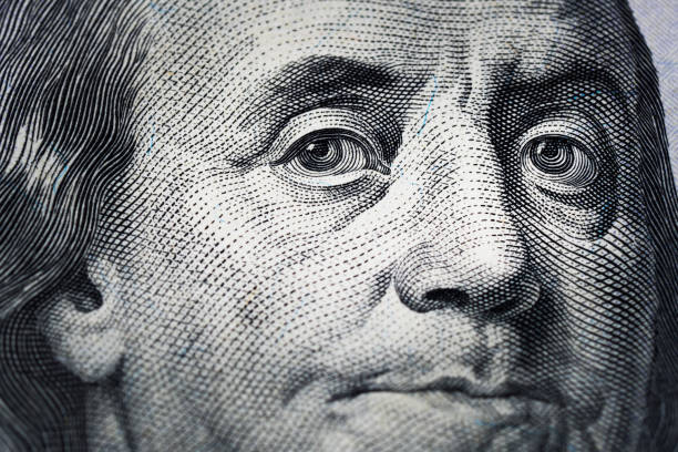 istock Closeup portrait Benjamin Franklin on 100 us dollar bill. 1778663583