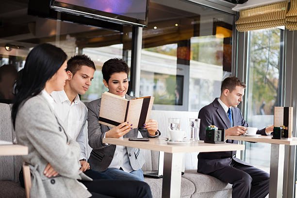 istock Businesspeople in cafe 177866668