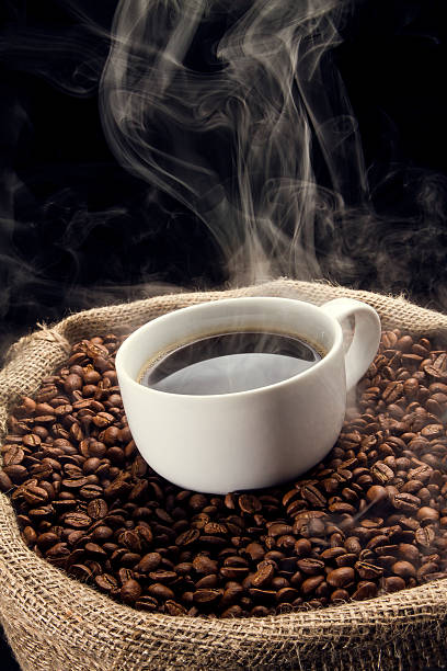 istock Coffee beans in the sack with cup of coffee. 177867524