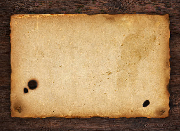 istock old paper on brown wood texture 177867783
