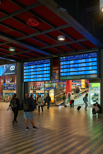 Prague, Czech Republic – October 04, 2023: Display panels and travelers at Prague Central Station in the Czech Republic