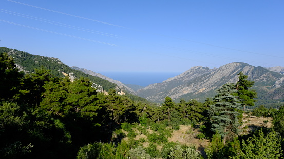 Sea view through the mountains from a high place