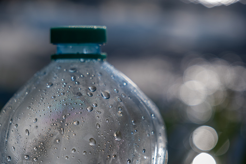 and a close-up of a plastic bottle