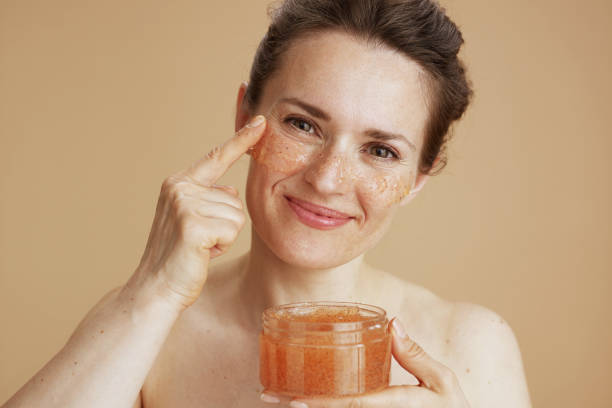 istock happy modern woman with face scrub 1778720477
