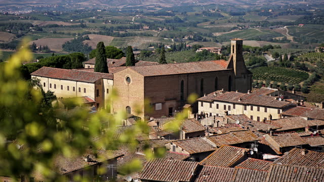 View of the town of San Gimignano in Tuscany Italy with summer weather, the town of San Gimignano in Tuscany, one of the most beautiful medieval towns of Tuscany, Italy