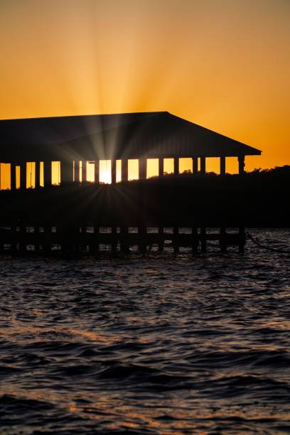 istock a wooden dock with a dock house on it during the sunset 1778723702