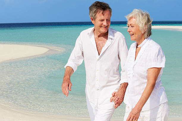 istock Senior Romantic Couple Walking On Beautiful Tropical Beach 177872553