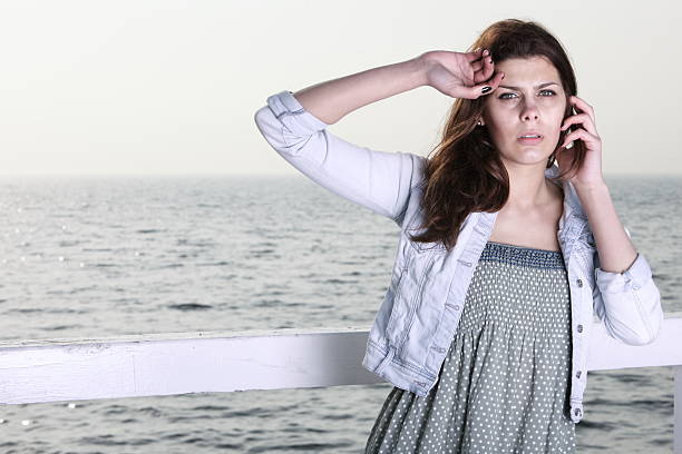 istock young woman on the pier 177872886