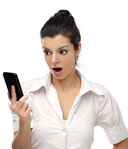 istock Surprise woman reading message on phone 177874797