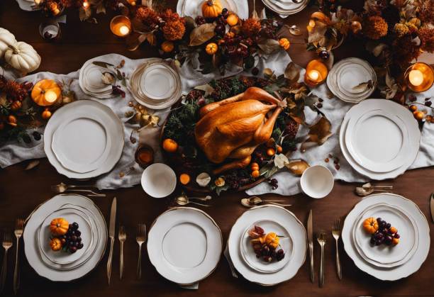 istock Festive Thanksgiving dinner table with a white tablecloth decorated with dishes 1778759662