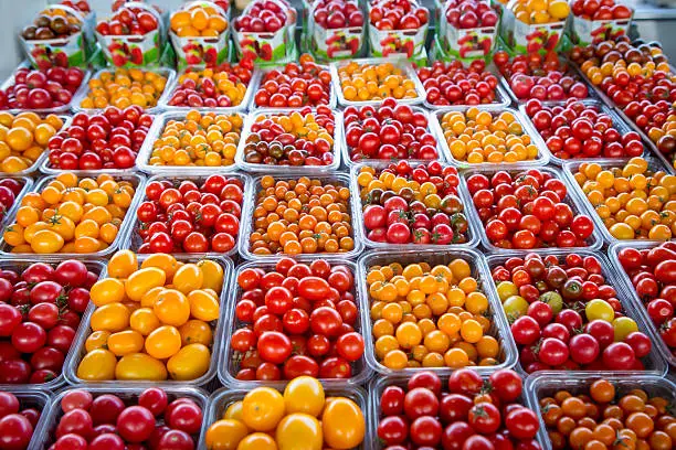 Vibrant and colorful aray of tomato's at a farmer's market