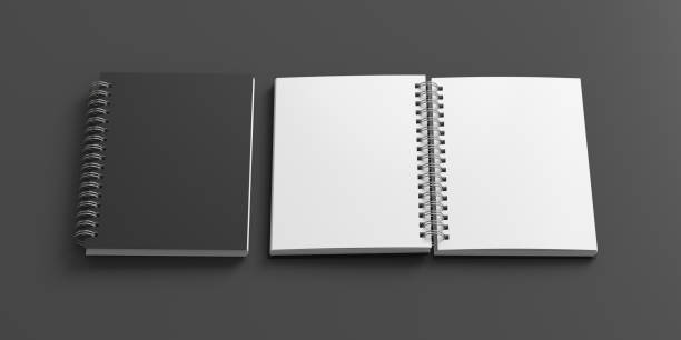 istock Notebook mockup. Closed and open blank notebook with black cover. Spiral notepad on gray background 1778769297