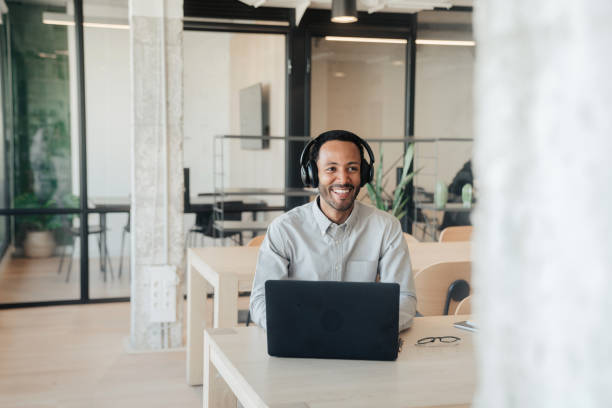 istock Hispanic man working on his laptop 1778777178
