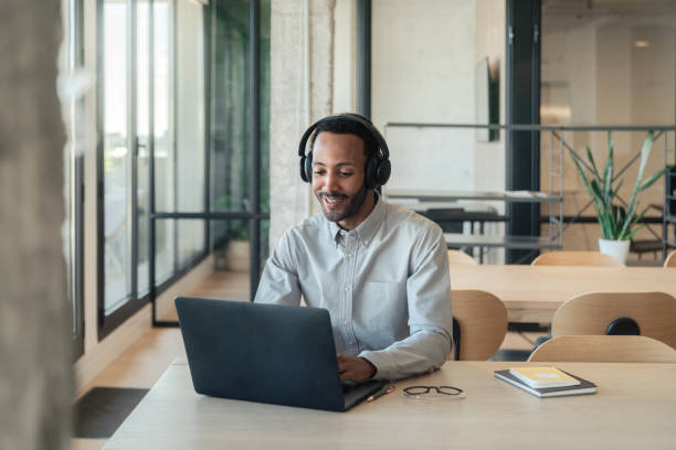 istock Hispanic man working on his laptop 1778777188