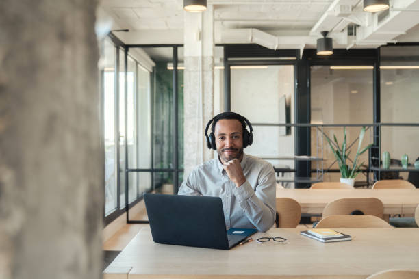 istock Hispanic man working on his laptop 1778777222