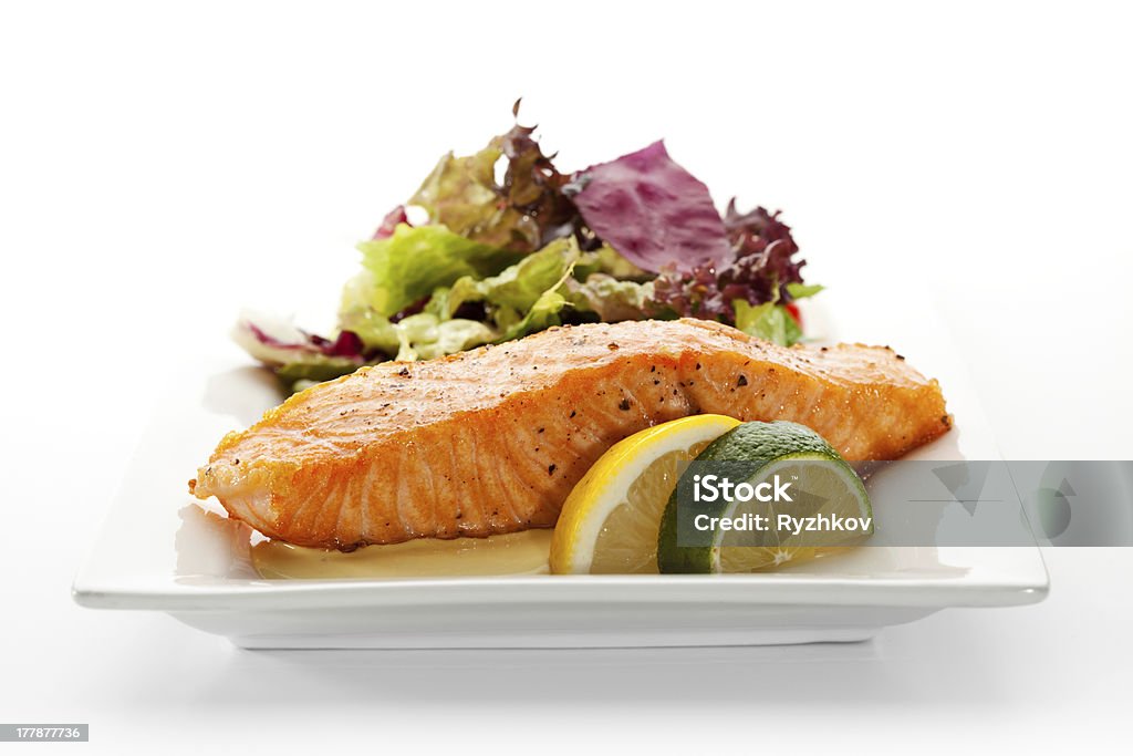 Salmon Steak Grilled Salmon with Fresh Salad Leaf Plate Stock Photo
