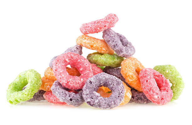istock Pile of sweet crispy corn rings isolated on a white background. Cereal breakfast. Fruit loops. Colorful corn cereals. 1778785365
