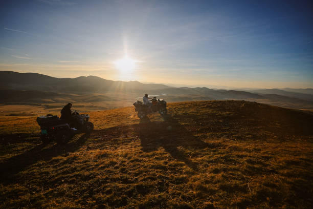 istock group of people riding ATV quads over the mountain 1778791421
