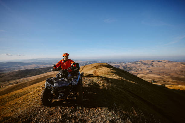 istock all terrain vehicle ride over the mountain 1778793077