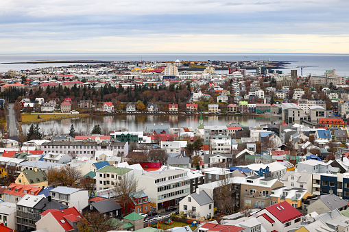 colorful houses and rooftops of Reykjavik; ariel view of Tjörnin pond; view seen from the top of the Hallgrimskirkja Church