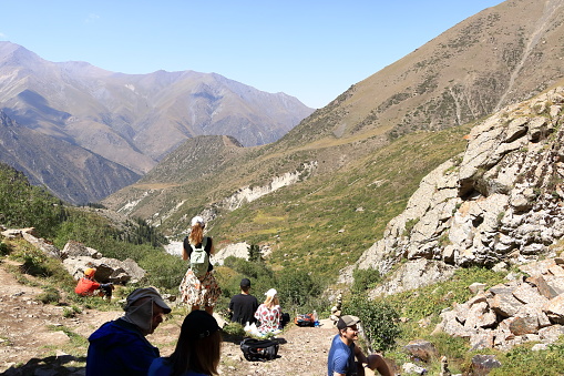 August 19 2023 - Ala Archa national park, Kyrgyzstan in Central Asia: people enjoy hiking in the Ala Archa national Park in summer