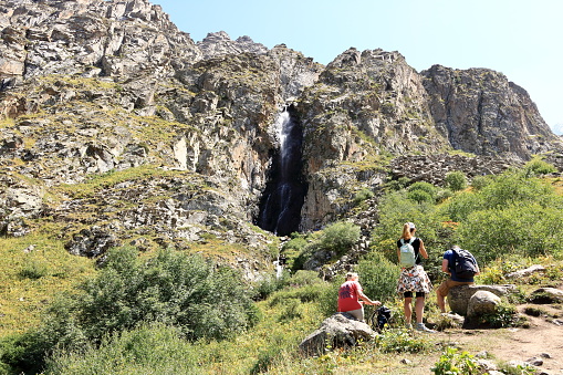 August 19 2023 - Ala Archa national park, Kyrgyzstan in Central Asia: people enjoy hiking in the Ala Archa national Park in summer