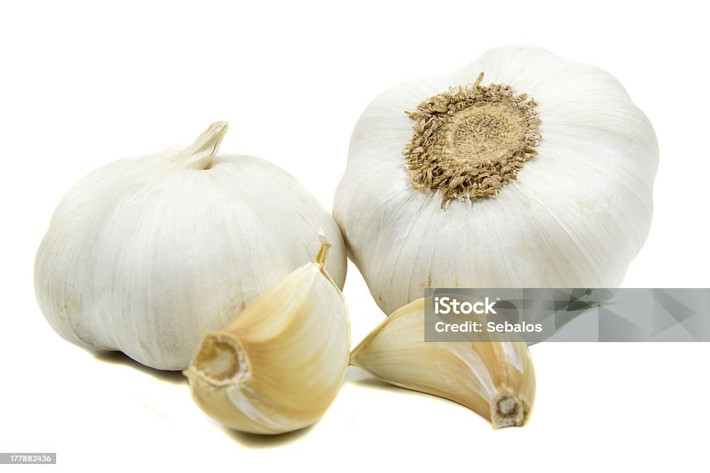 Garlic Garlic isolated on a white background Crop - Plant Stock Photo