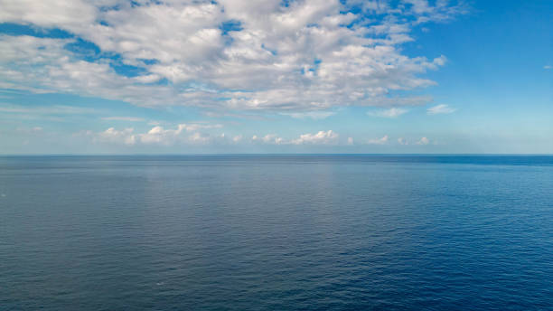 istock The deep blue Pacific Ocean with a cloudy blue sky 1778829757
