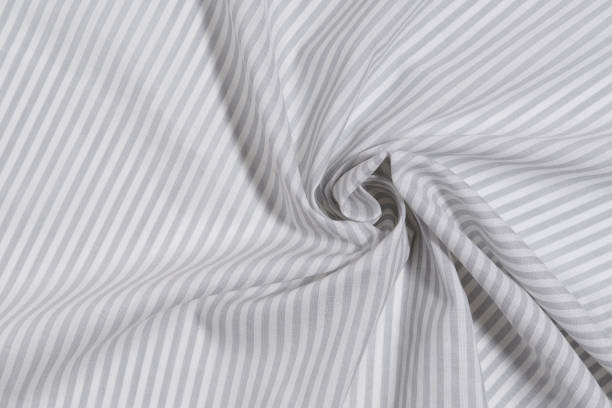 istock twisted cotton fabric in a gray and white stripe close-up. material for sewing concept. Image for your design 1778845774