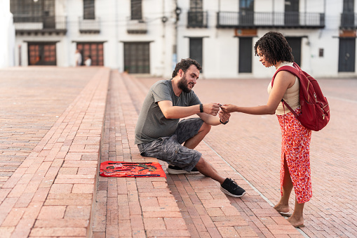 Woman Trying Handmade Colombian Craft Bracelet