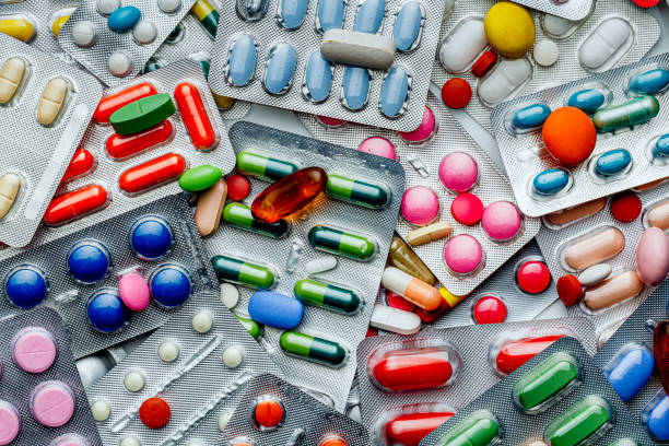 Background of a large group of assorted capsules, pills and blisters stock photo