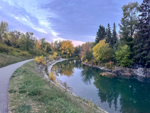 istock Fall colours and a purple sky sunrise along the Elbow River pathway in Calgary, Alberta 1778921774