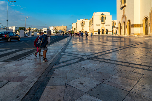 Casablanca, Morocco - Sep. 12 2023: Street view of Rue de Tiznit. People going to work and school in the morning walking on the street, Casablanca, Morocco.