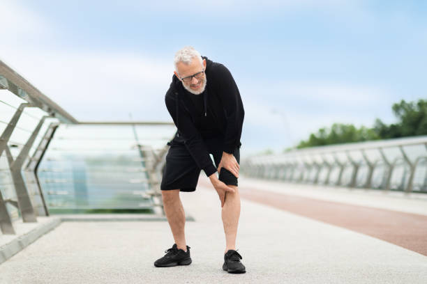 istock Senior man suffering with knee pain during workout 1778925274