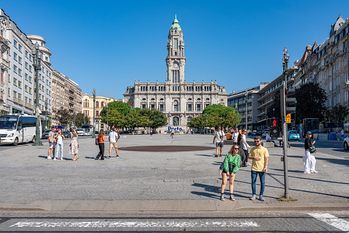 Santiago, Chile - October 23, 2016: People walking on Plaza de Armas with Central Post Office Building (Correo Central) on the background. This is a historic  house and a famous touristic attraction.