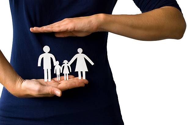 hands protecting a paper chain family