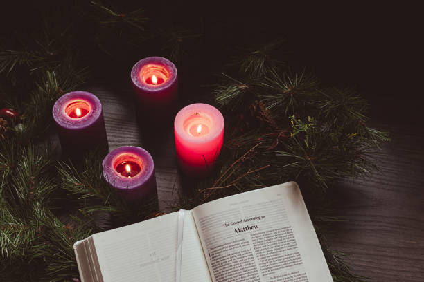 istock Open bible and four candles lit in an advent wreath 1778932108