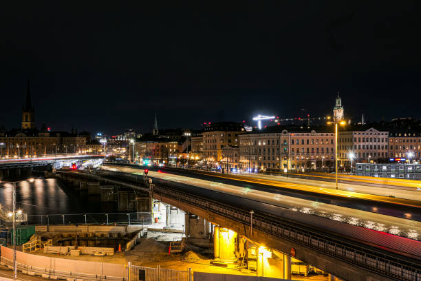 istock High angle view of illuminated bridge over river at night 1778948763
