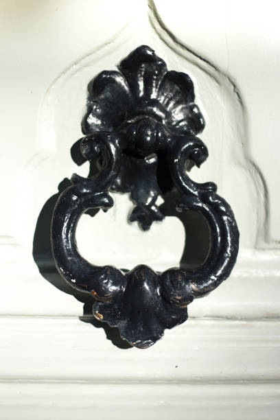 istock Paris, France: Antique Door Knocker on White Door Close-Up 1778989622