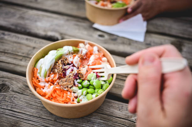 Healthy poke bowl close up.