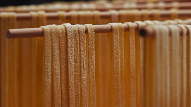 Linguini Pasta Hanging on a Pasta Dryer