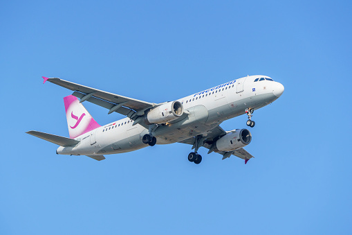 Turkey - Antalya 11.04.2023: Freebird Airlines passenger plane lands at Antalya airport.