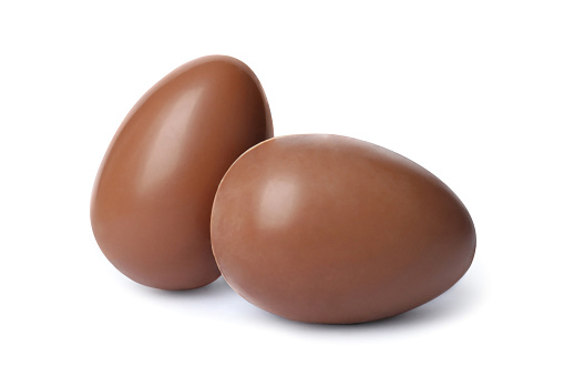 Two tasty chocolate eggs isolated on white