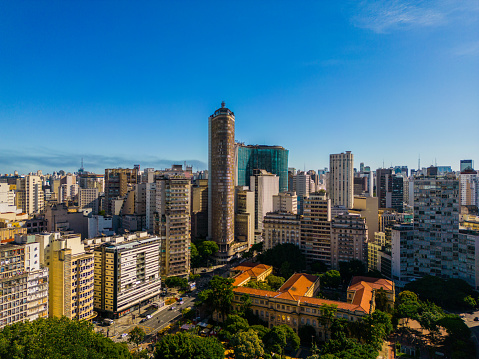 Park and charming buildings in the center of Sao Paulo in Brazil