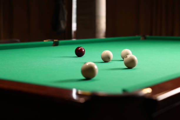 istock Many billiard balls on green table indoors 1779191365