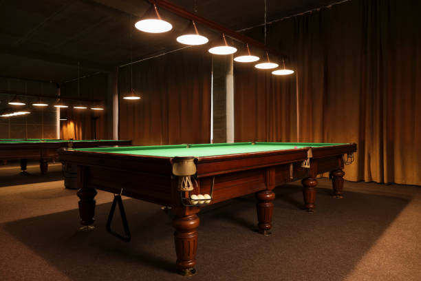 istock Stylish billiard table with white balls in pocket indoors 1779191394