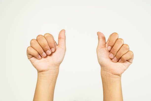 istock Pointing upwards with your thumb. Close up, isolated on white background. 1779192455