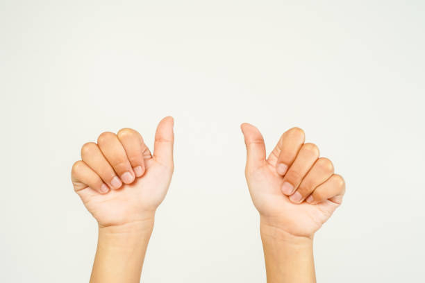 istock Pointing upwards with your thumb. Close up, isolated on white background. 1779192462