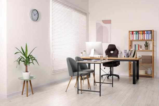 istock Director's office with large wooden table and comfortable armchairs. Interior design 1779211157
