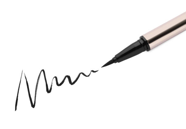 istock Eyeliner marker and stroke on white background, top view. Makeup product 1779211714